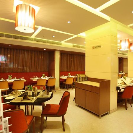 Comfort Inn Legacy Раджкот Ресторан фото