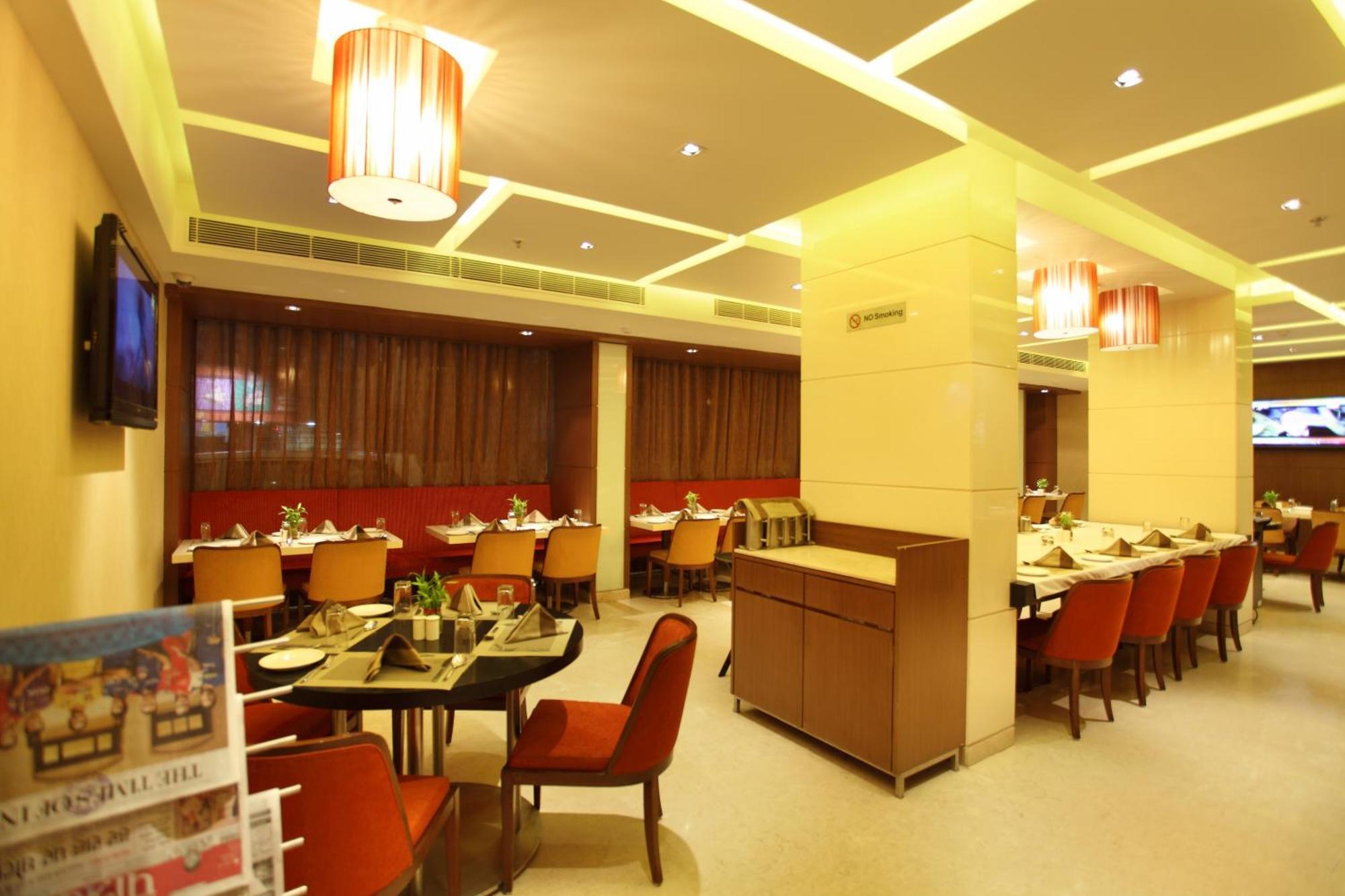 Comfort Inn Legacy Раджкот Ресторан фото