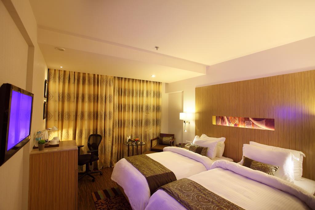 Comfort Inn Legacy Раджкот Номер фото