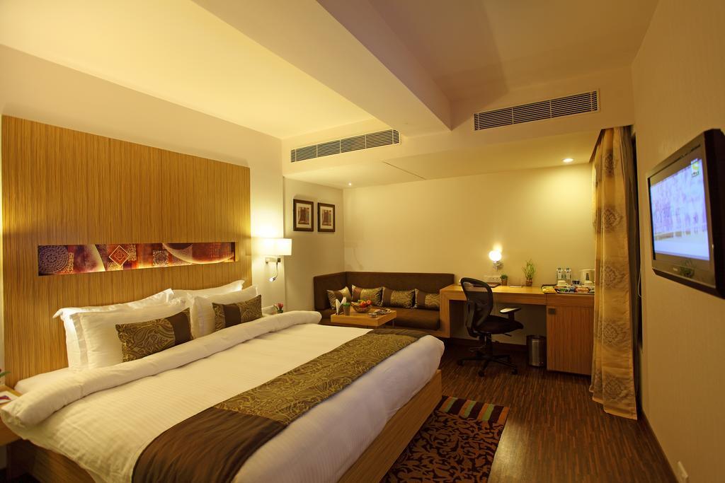 Comfort Inn Legacy Раджкот Номер фото